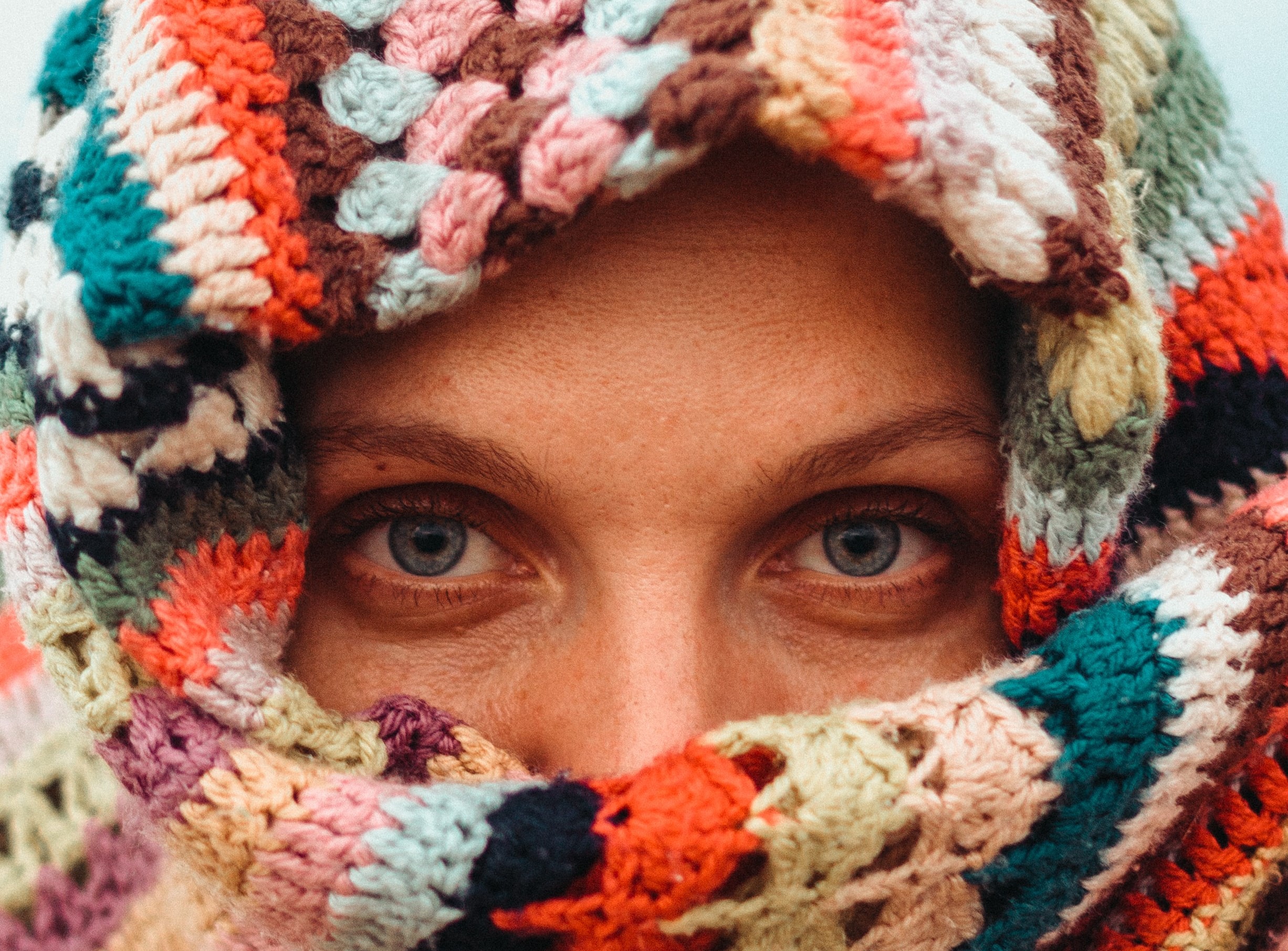 Person with woven blanket